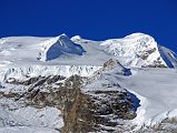 
Close up of climbing route to Mera Peak on left, Mera Peak Central Summit (6461m), the rock sheltering Mera High Camp (5770m), and Mera Peak North Summit (6476m).
